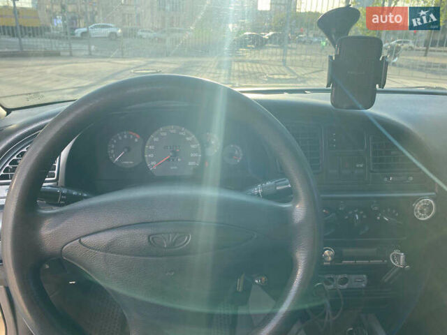 Бежевый Дэу Нубира, объемом двигателя 2 л и пробегом 287 тыс. км за 3000 $, фото 16 на Automoto.ua