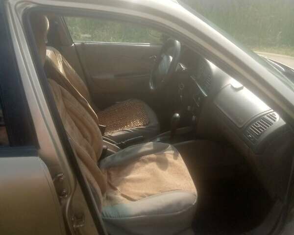 Бежевый Дэу Нубира, объемом двигателя 2 л и пробегом 240 тыс. км за 2700 $, фото 3 на Automoto.ua
