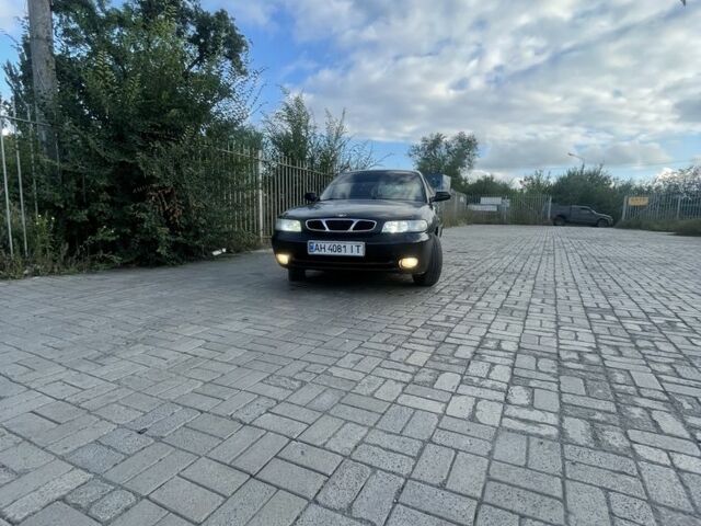 Черный Дэу Нубира, объемом двигателя 1.6 л и пробегом 258 тыс. км за 2000 $, фото 1 на Automoto.ua