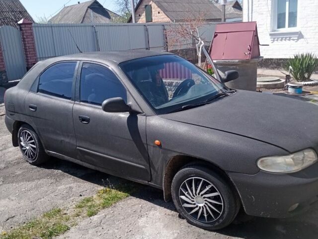 Черный Дэу Нубира, объемом двигателя 1.6 л и пробегом 230 тыс. км за 790 $, фото 9 на Automoto.ua