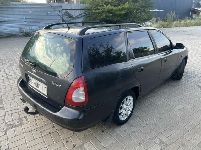 Черный Дэу Нубира, объемом двигателя 1.6 л и пробегом 258 тыс. км за 2000 $, фото 3 на Automoto.ua