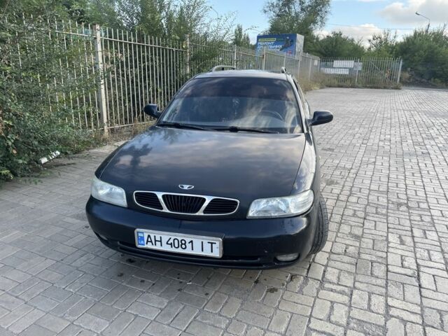 Черный Дэу Нубира, объемом двигателя 1.6 л и пробегом 258 тыс. км за 2000 $, фото 5 на Automoto.ua