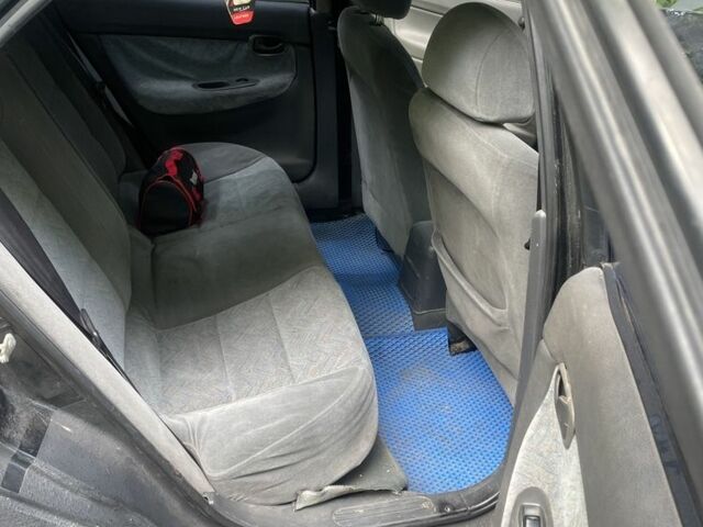 Черный Дэу Нубира, объемом двигателя 1.6 л и пробегом 235 тыс. км за 700 $, фото 4 на Automoto.ua