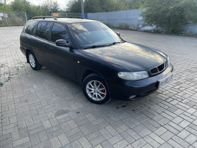 Черный Дэу Нубира, объемом двигателя 1.6 л и пробегом 258 тыс. км за 2000 $, фото 4 на Automoto.ua