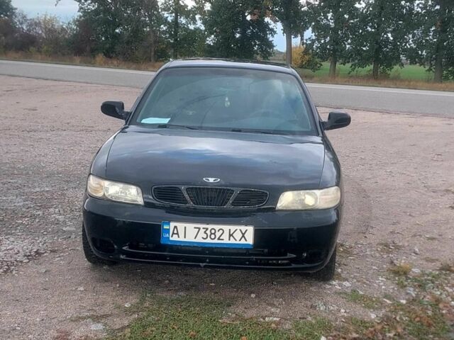 Черный Дэу Нубира, объемом двигателя 1.6 л и пробегом 503 тыс. км за 1313 $, фото 1 на Automoto.ua