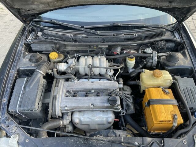 Черный Дэу Нубира, объемом двигателя 1.6 л и пробегом 258 тыс. км за 2000 $, фото 10 на Automoto.ua