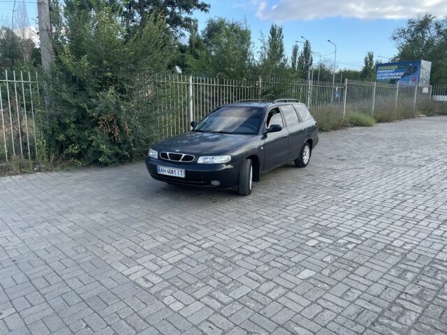 Черный Дэу Нубира, объемом двигателя 1.6 л и пробегом 258 тыс. км за 2000 $, фото 2 на Automoto.ua