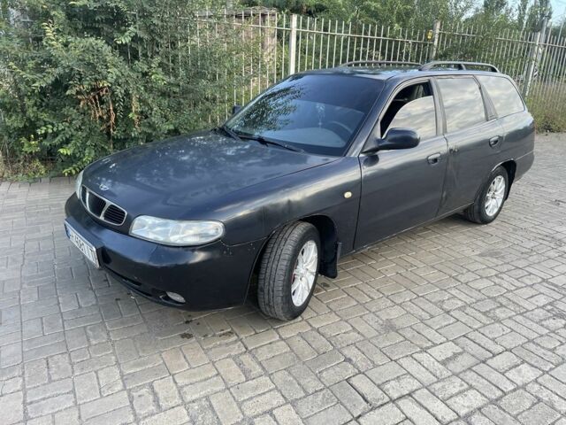 Черный Дэу Нубира, объемом двигателя 1.6 л и пробегом 258 тыс. км за 2000 $, фото 8 на Automoto.ua