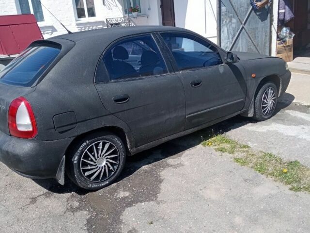 Черный Дэу Нубира, объемом двигателя 1.6 л и пробегом 230 тыс. км за 790 $, фото 8 на Automoto.ua