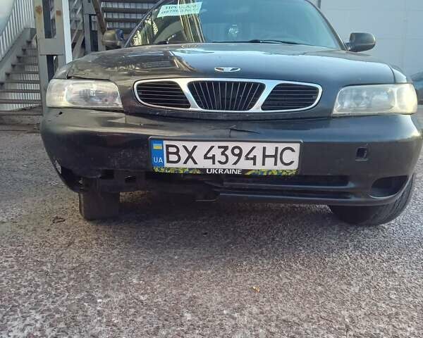 Чорний Деу Нубіра, об'ємом двигуна 1.6 л та пробігом 390 тис. км за 1100 $, фото 1 на Automoto.ua