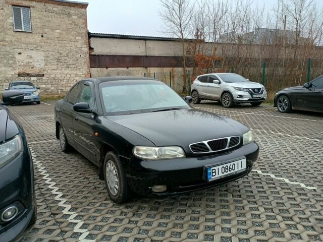 Чорний Деу Нубіра, об'ємом двигуна 1.6 л та пробігом 150 тис. км за 1250 $, фото 8 на Automoto.ua