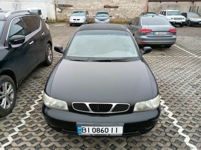 Чорний Деу Нубіра, об'ємом двигуна 1.6 л та пробігом 150 тис. км за 1250 $, фото 4 на Automoto.ua