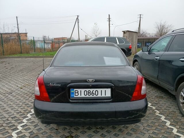 Чорний Деу Нубіра, об'ємом двигуна 1.6 л та пробігом 150 тис. км за 1250 $, фото 3 на Automoto.ua