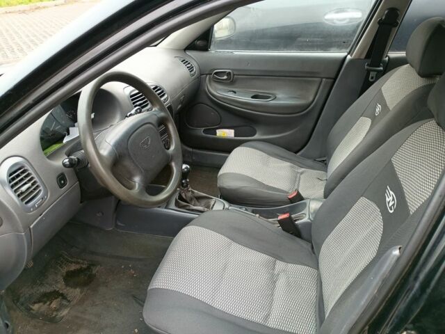 Чорний Деу Нубіра, об'ємом двигуна 1.6 л та пробігом 150 тис. км за 1250 $, фото 9 на Automoto.ua