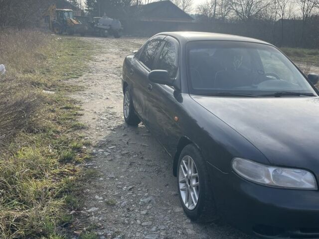 Чорний Деу Нубіра, об'ємом двигуна 1.6 л та пробігом 3 тис. км за 1100 $, фото 1 на Automoto.ua