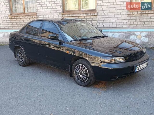 Черный Дэу Нубира, объемом двигателя 1.6 л и пробегом 360 тыс. км за 1700 $, фото 7 на Automoto.ua