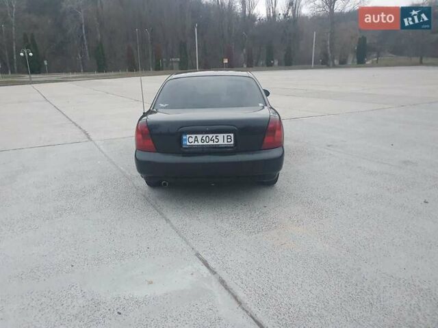 Черный Дэу Нубира, объемом двигателя 1.6 л и пробегом 261 тыс. км за 2500 $, фото 10 на Automoto.ua