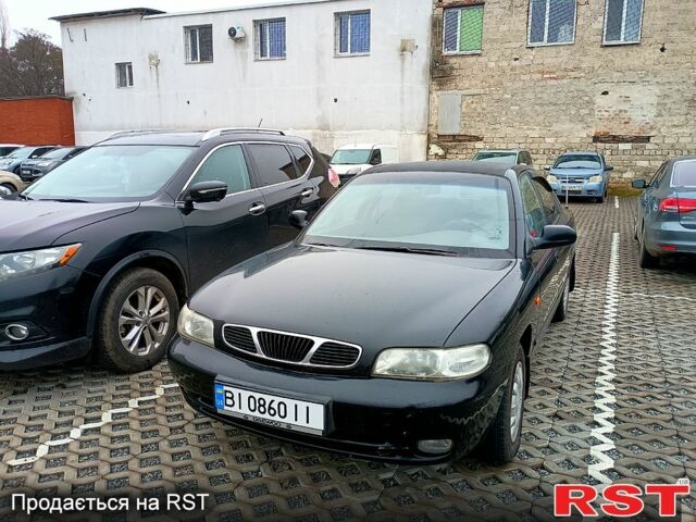 Черный Дэу Нубира, объемом двигателя 1.6 л и пробегом 190 тыс. км за 1250 $, фото 8 на Automoto.ua