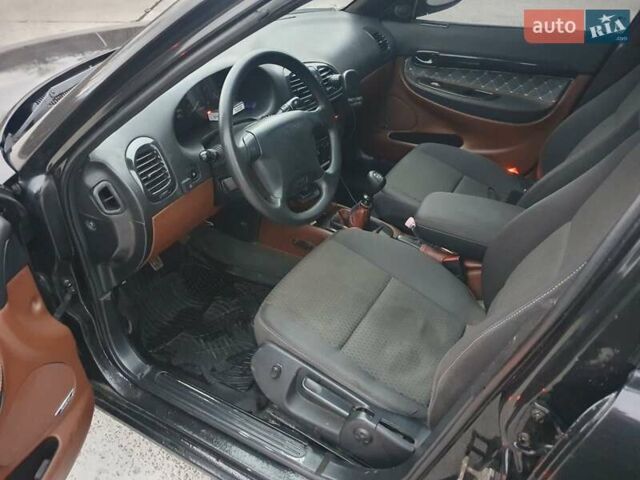 Черный Дэу Нубира, объемом двигателя 1.6 л и пробегом 261 тыс. км за 2500 $, фото 16 на Automoto.ua