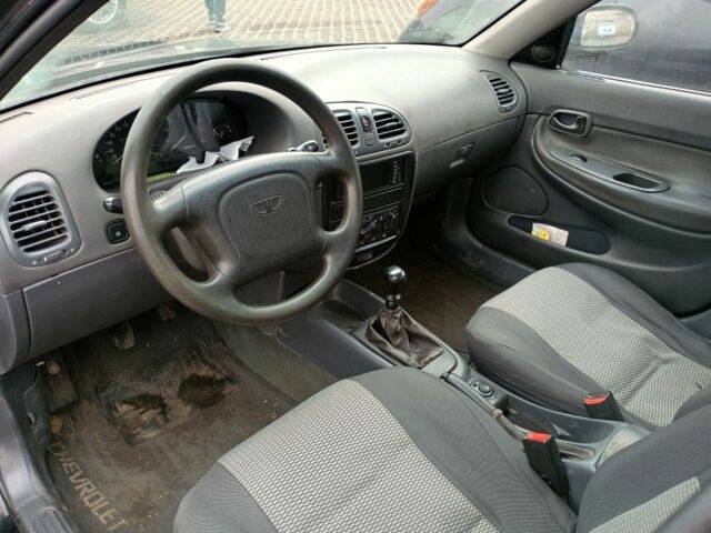 Чорний Деу Нубіра, об'ємом двигуна 1.6 л та пробігом 150 тис. км за 1250 $, фото 7 на Automoto.ua