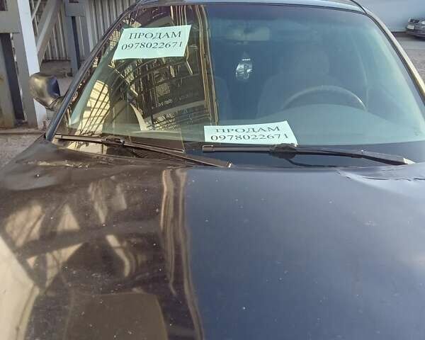 Чорний Деу Нубіра, об'ємом двигуна 1.6 л та пробігом 390 тис. км за 1100 $, фото 4 на Automoto.ua