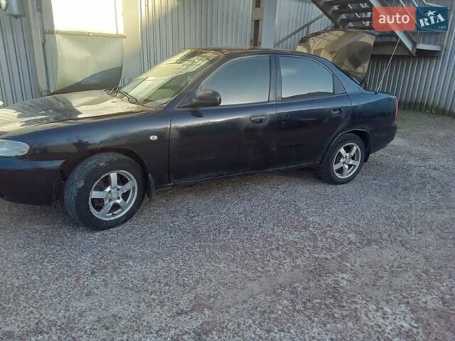 Чорний Деу Нубіра, об'ємом двигуна 1.6 л та пробігом 390 тис. км за 1100 $, фото 3 на Automoto.ua