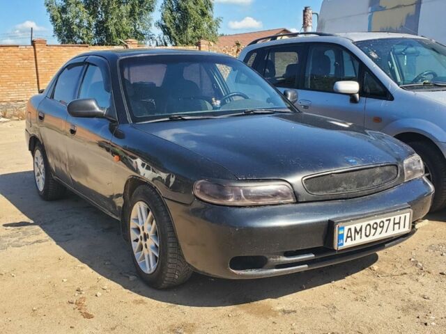 Чорний Деу Нубіра, об'ємом двигуна 1.6 л та пробігом 350 тис. км за 1500 $, фото 2 на Automoto.ua