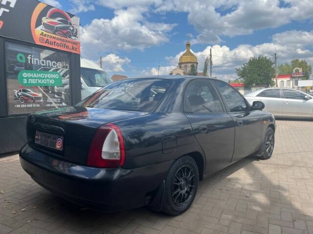 Чорний Деу Нубіра, об'ємом двигуна 1.6 л та пробігом 280 тис. км за 1800 $, фото 6 на Automoto.ua