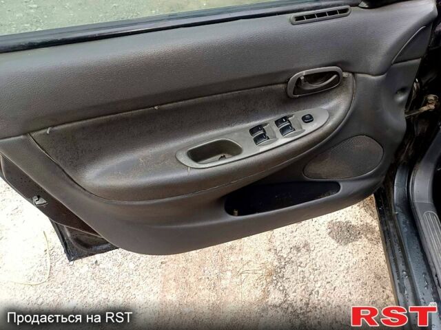 Чорний Деу Нубіра, об'ємом двигуна 1.6 л та пробігом 111 тис. км за 1111 $, фото 10 на Automoto.ua