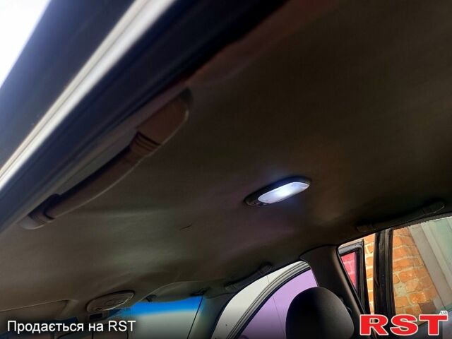 Чорний Деу Нубіра, об'ємом двигуна 1.6 л та пробігом 111 тис. км за 1111 $, фото 6 на Automoto.ua