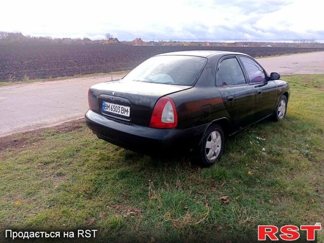 Чорний Деу Нубіра, об'ємом двигуна 1.6 л та пробігом 111 тис. км за 1111 $, фото 3 на Automoto.ua