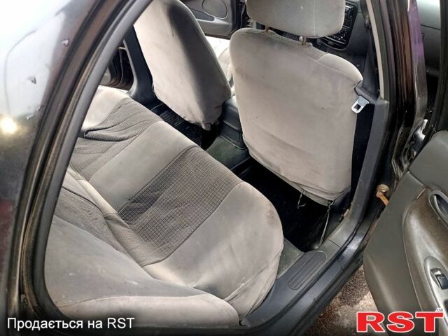 Чорний Деу Нубіра, об'ємом двигуна 1.6 л та пробігом 111 тис. км за 1111 $, фото 7 на Automoto.ua