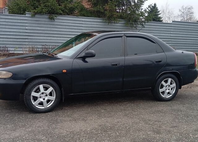 Черный Дэу Нубира, объемом двигателя 1.6 л и пробегом 3 тыс. км за 1650 $, фото 5 на Automoto.ua