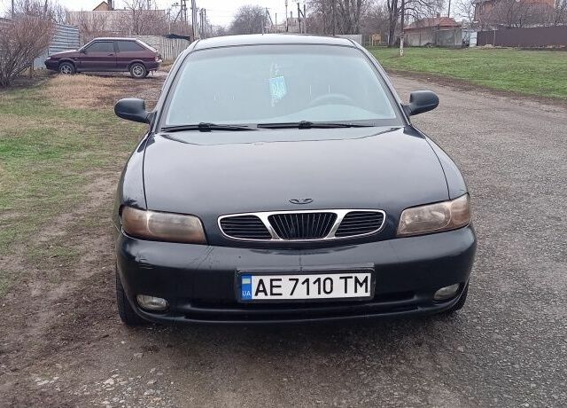 Черный Дэу Нубира, объемом двигателя 1.6 л и пробегом 3 тыс. км за 1650 $, фото 7 на Automoto.ua