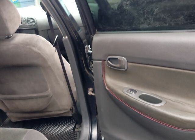 Черный Дэу Нубира, объемом двигателя 1.6 л и пробегом 3 тыс. км за 1650 $, фото 11 на Automoto.ua