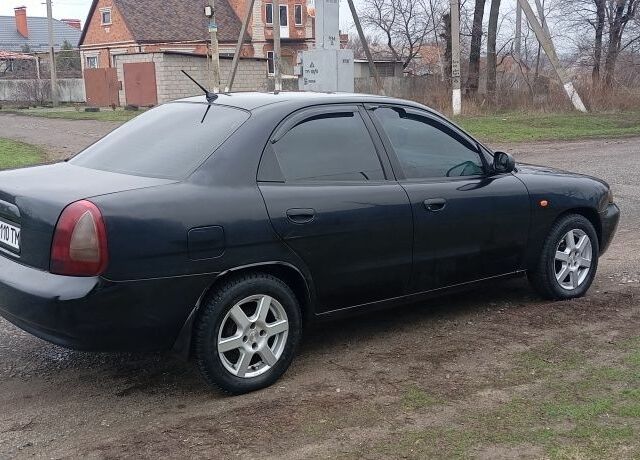 Черный Дэу Нубира, объемом двигателя 1.6 л и пробегом 3 тыс. км за 1650 $, фото 4 на Automoto.ua