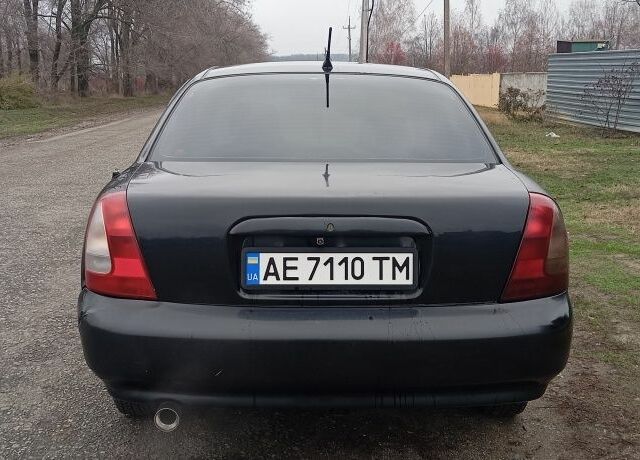 Черный Дэу Нубира, объемом двигателя 1.6 л и пробегом 3 тыс. км за 1650 $, фото 3 на Automoto.ua