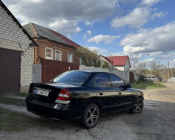Черный Дэу Нубира, объемом двигателя 2 л и пробегом 414 тыс. км за 1800 $, фото 5 на Automoto.ua