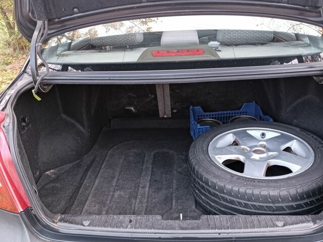 Черный Дэу Нубира, объемом двигателя 1.8 л и пробегом 302 тыс. км за 2700 $, фото 4 на Automoto.ua