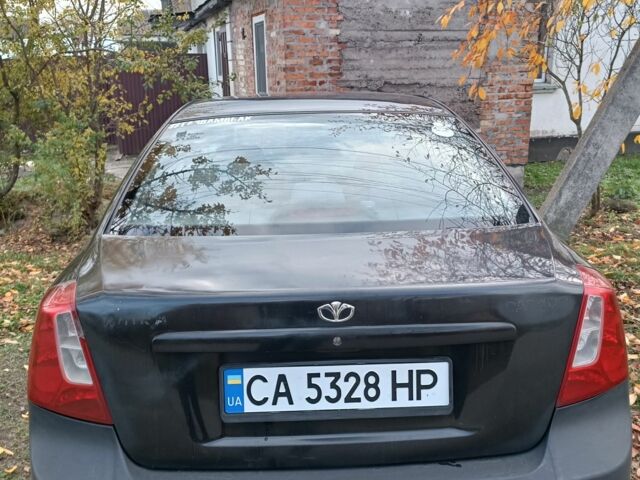 Черный Дэу Нубира, объемом двигателя 1.8 л и пробегом 302 тыс. км за 2700 $, фото 3 на Automoto.ua