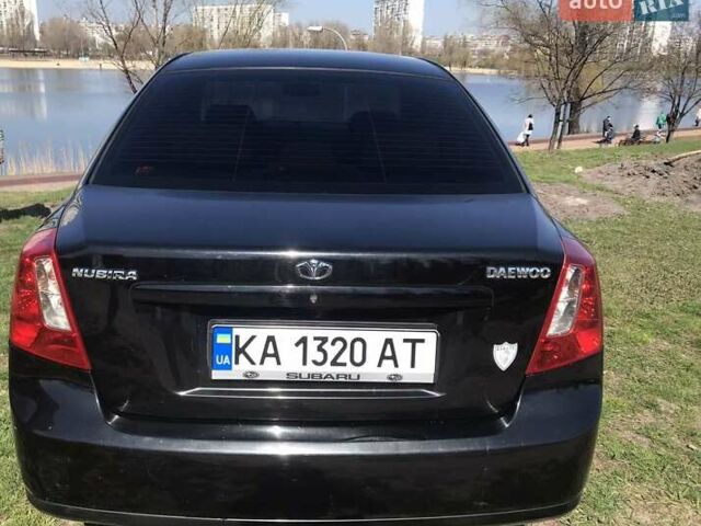 Черный Дэу Нубира, объемом двигателя 1.8 л и пробегом 180 тыс. км за 3800 $, фото 2 на Automoto.ua