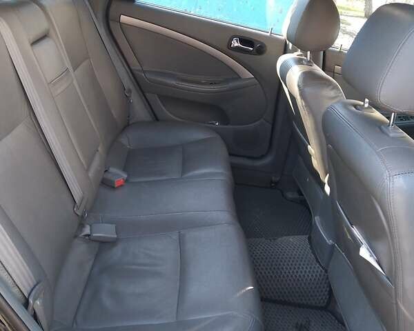 Черный Дэу Нубира, объемом двигателя 1.6 л и пробегом 255 тыс. км за 5000 $, фото 1 на Automoto.ua