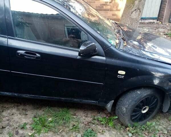Черный Дэу Нубира, объемом двигателя 1.8 л и пробегом 210 тыс. км за 2700 $, фото 2 на Automoto.ua