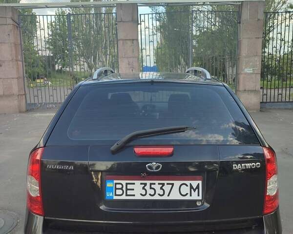 Чорний Деу Нубіра, об'ємом двигуна 1.6 л та пробігом 200 тис. км за 4500 $, фото 1 на Automoto.ua