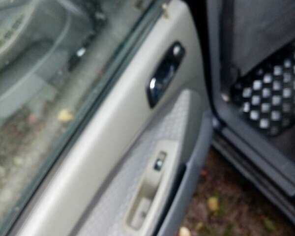 Черный Дэу Нубира, объемом двигателя 1.8 л и пробегом 210 тыс. км за 2700 $, фото 3 на Automoto.ua