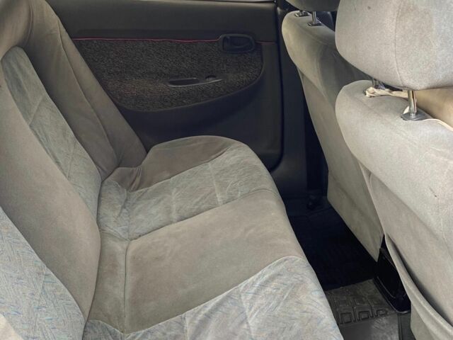 Красный Дэу Нубира, объемом двигателя 1.6 л и пробегом 180 тыс. км за 1050 $, фото 4 на Automoto.ua