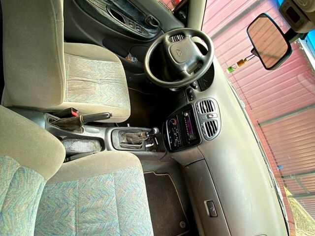 Красный Дэу Нубира, объемом двигателя 1.6 л и пробегом 0 тыс. км за 3000 $, фото 5 на Automoto.ua