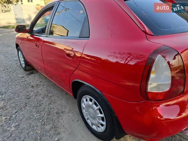 Червоний Деу Нубіра, об'ємом двигуна 0 л та пробігом 183 тис. км за 2750 $, фото 23 на Automoto.ua