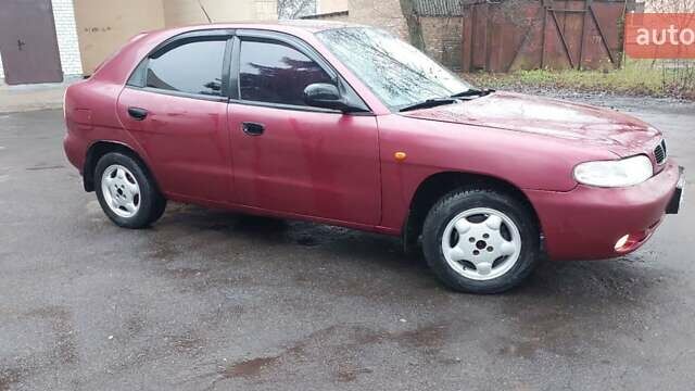Червоний Деу Нубіра, об'ємом двигуна 1.6 л та пробігом 201 тис. км за 1650 $, фото 1 на Automoto.ua