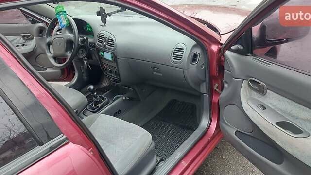 Червоний Деу Нубіра, об'ємом двигуна 1.6 л та пробігом 201 тис. км за 1650 $, фото 10 на Automoto.ua